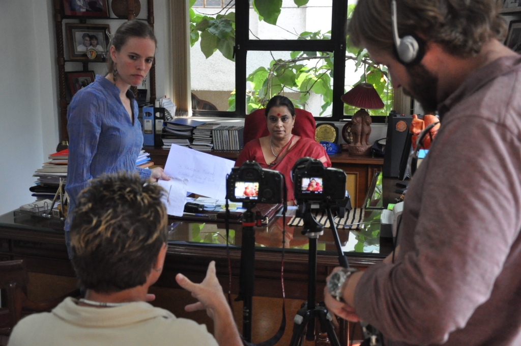 Evan Grae Davis and his team interviewing a women's rights campaigner in India.